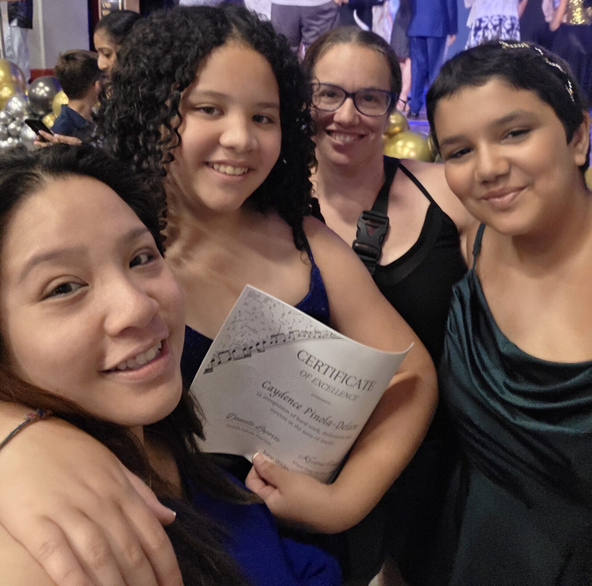 Danielle, Casey, and their daughters celebrating together